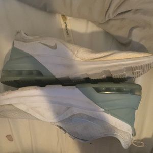 White and turquoise Nike shoes